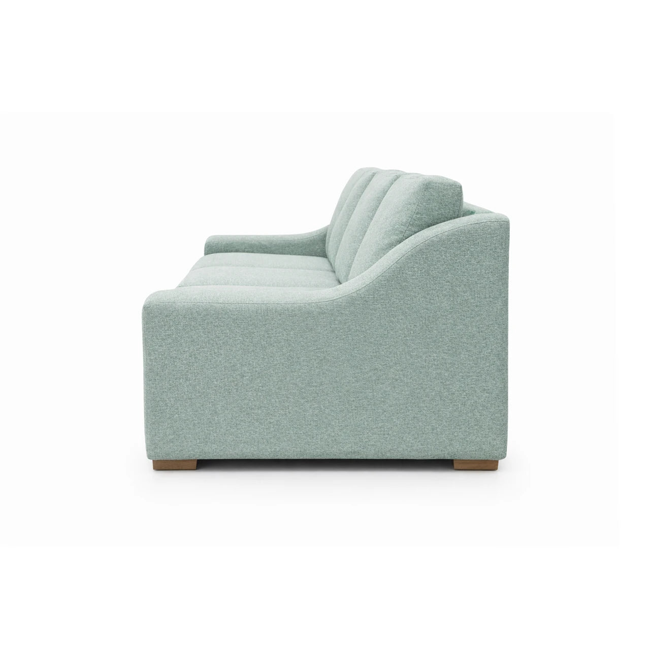 Side view of grey sofa on white background