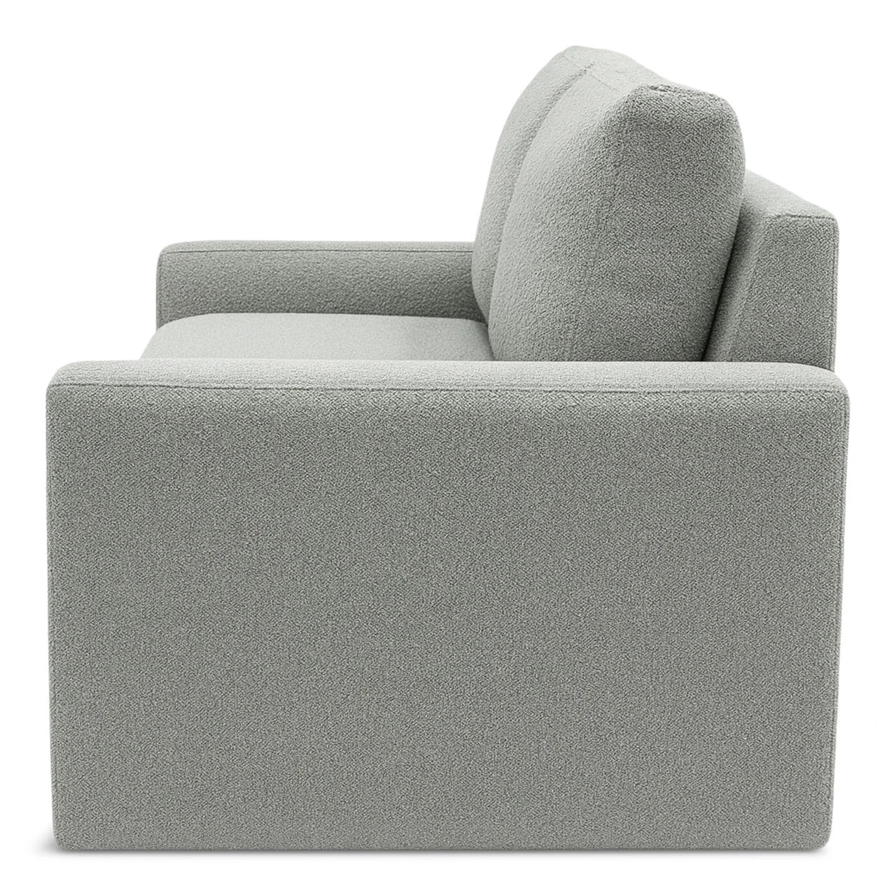Side view of grey sofa on white background