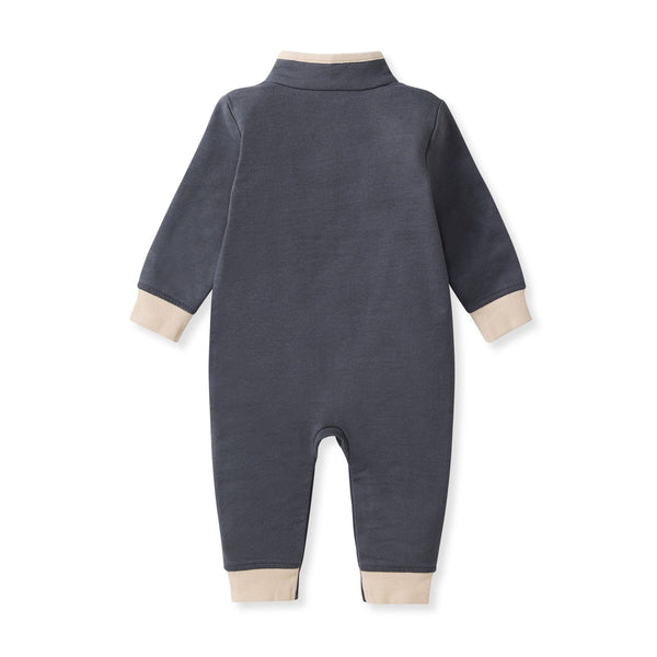 Navy blue baby jumsuit with beige cuffs back view