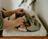 Cotton Muslin Changing Pad Cover: Taupe Cross - DIGS