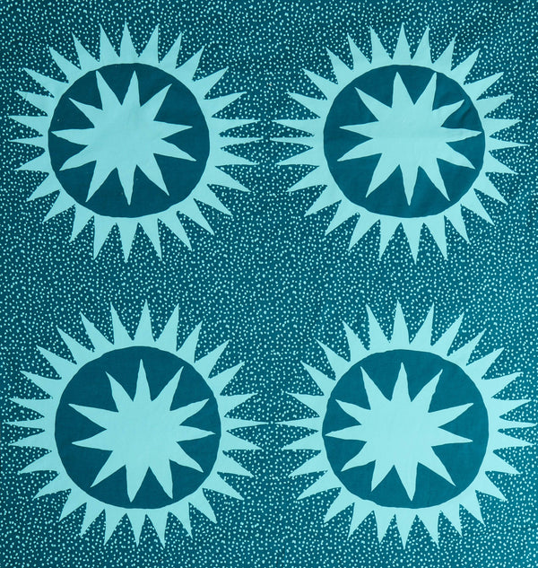 Pattern of blue starburst shapes on a teal background