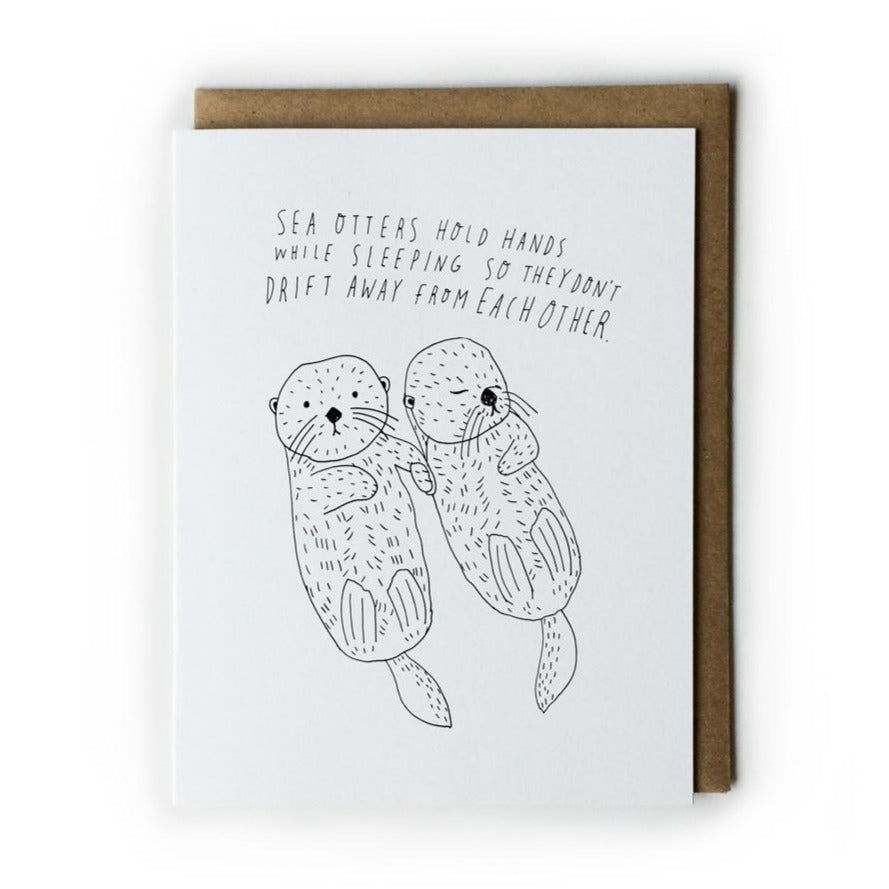 Sea Otters Holding Hands Card