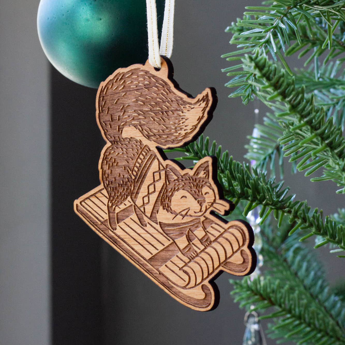 Sledding Fox Wood Ornament - DIGS